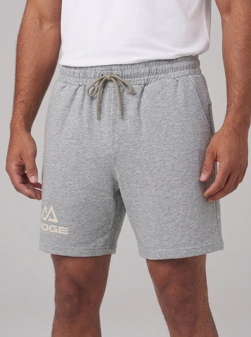 Flower Gray RIDGE Training Short, front view showing the drawcord waistband, side seam pockets and the RIDGE lockup at the thigh